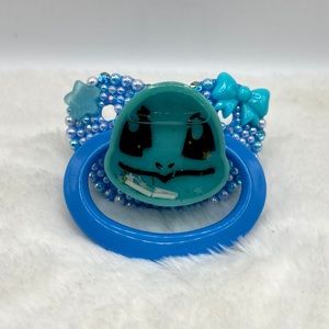 Squirtle liquid shaker paci